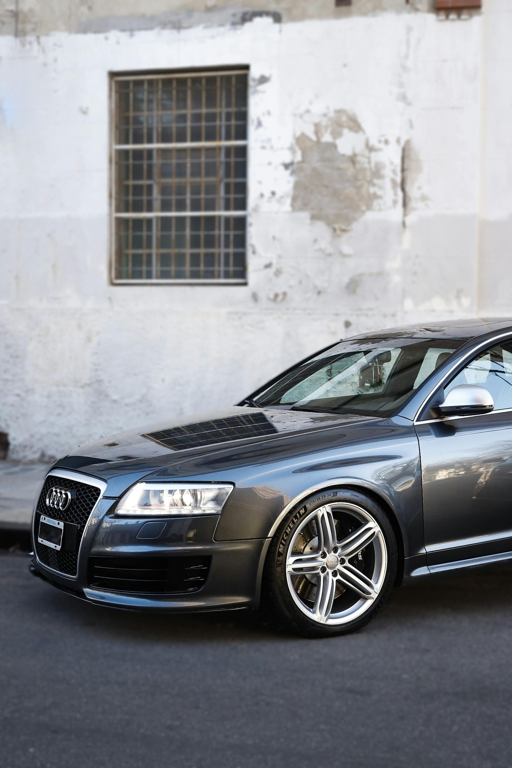 Audi RS6 on a city street, showcasing sleek design and modern elegance.